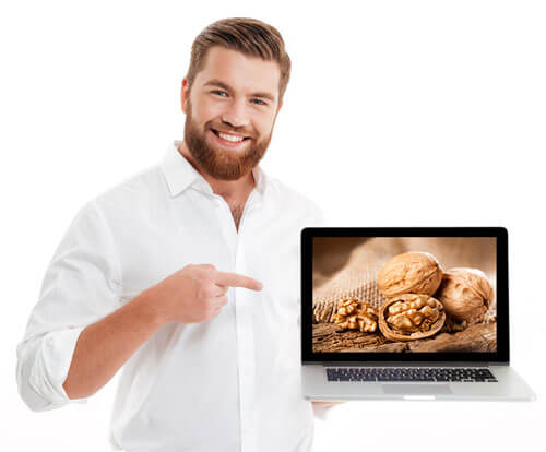 Guy presenting walnuts on screen
